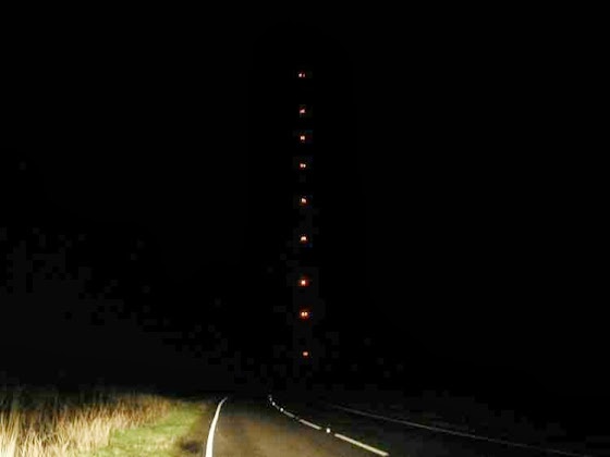 caistor road catseyes and Belmont Tower nine aircraft lights at night