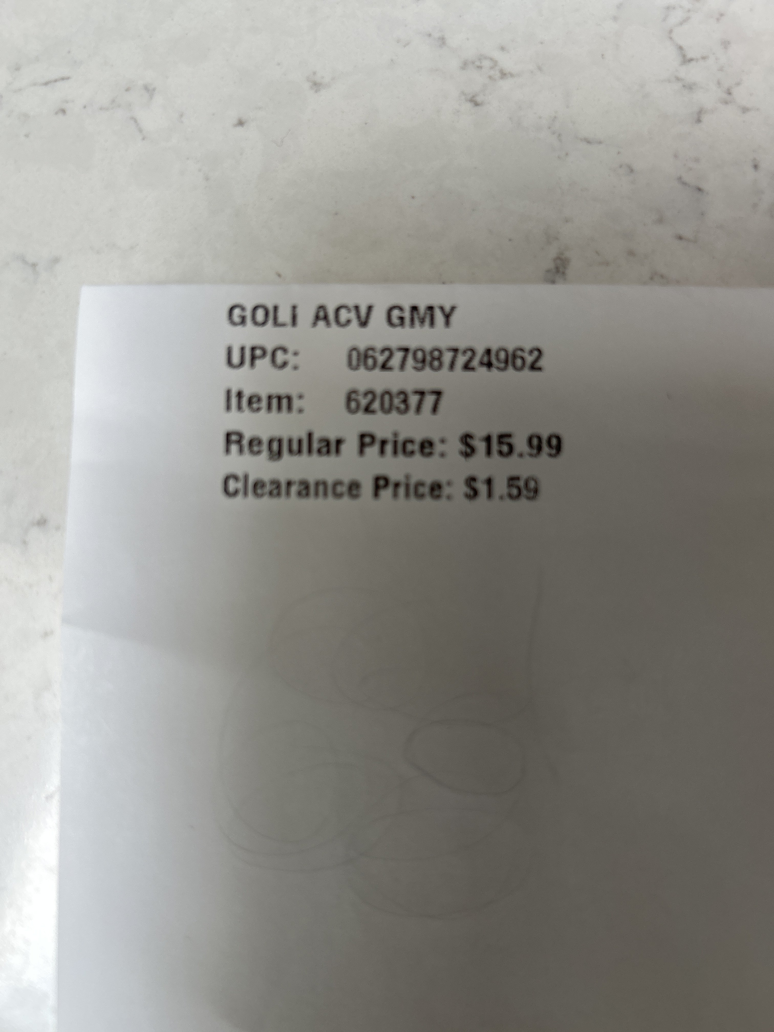 printed cvs clearance lookup slip showing goli apple cider vinegar gummies marked down from $15.99 to $1.59 with item and upc numbers visible