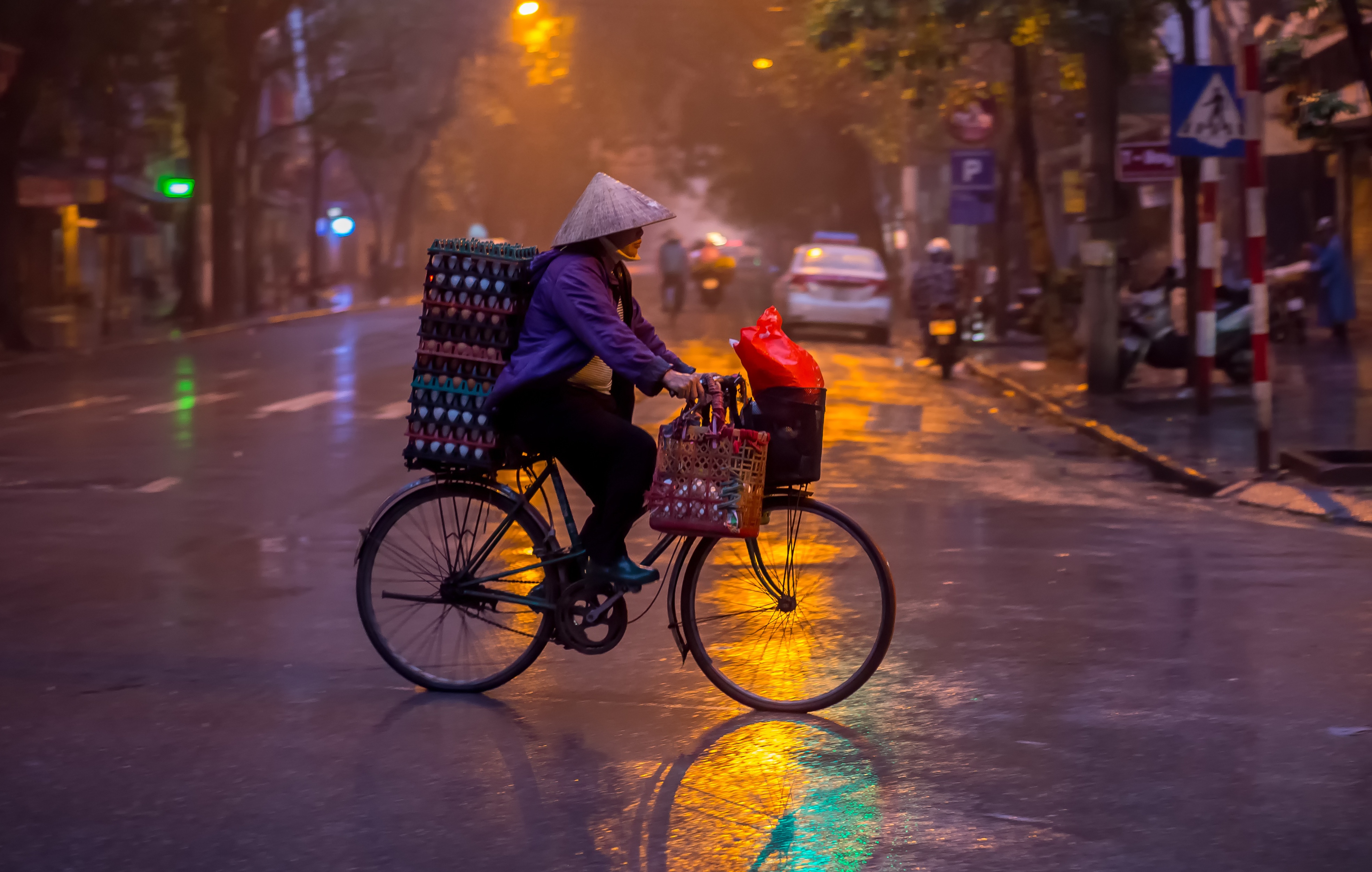 riding on the handlebars of a bike