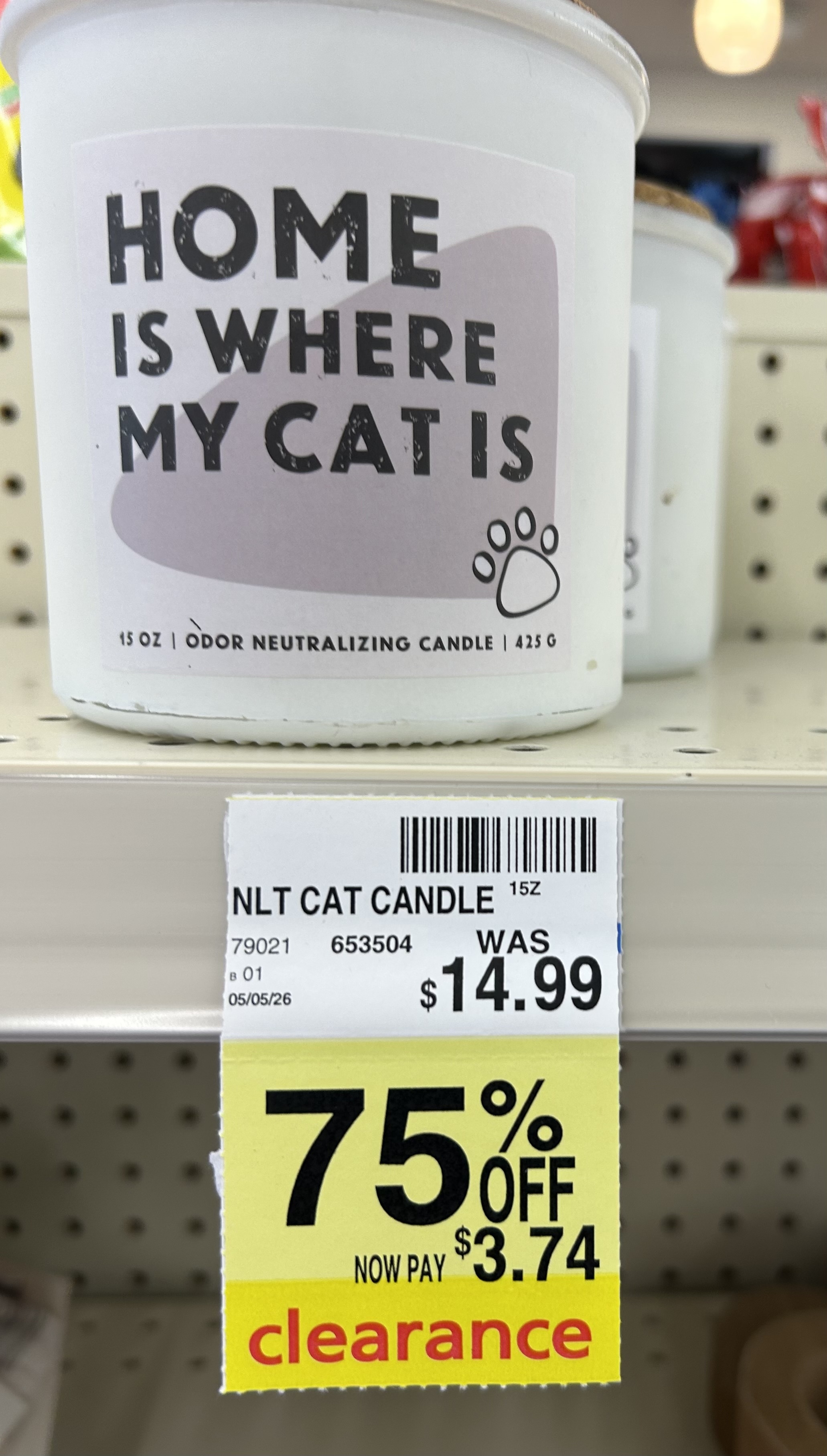 white “home is where my cat is” odor neutralizing candle on cvs clearance for $3.74, regularly $14.99