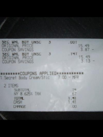 A photograph of a CVS receipt showing the purchase of clearance Secret deodorant. The receipt lists 'SEC WHL BDY UNSC' items with an original price of $15.49 each, with clearance discounts applied. A manufacturer's coupon for '1 Secret Body Cream/Stic' worth $7.00 is also used. The subtotal is $0.74, with an additional NY 8.625% tax of $0.67, bringing the total to $1.41. The payment was made in cash, with no change given.